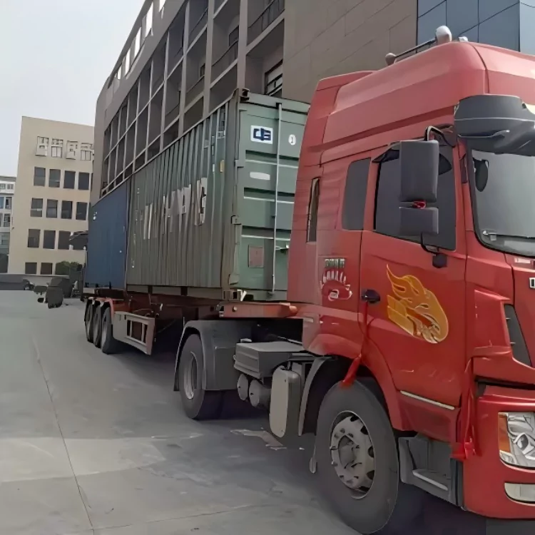 The picture shows the scene where the container is already full and the truck is ready to depart