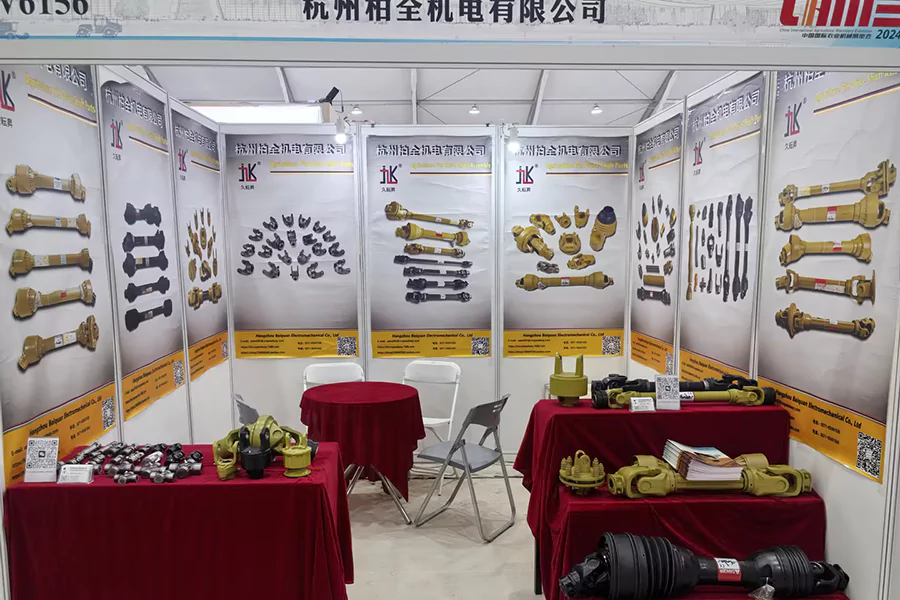 The picture shows Baiquan Company's booth at CIAME2024, exhibiting PTO shafts and various accessories including yokes, Safety shield, torque limiter, cardan joint, U-joint, tube, etc